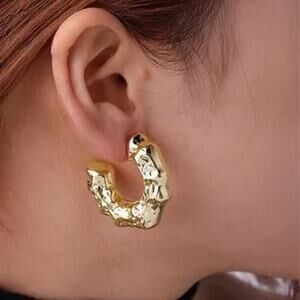 Gold textured hoop earrings